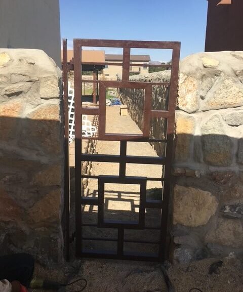 Brown metal gate installation in El Paso TX