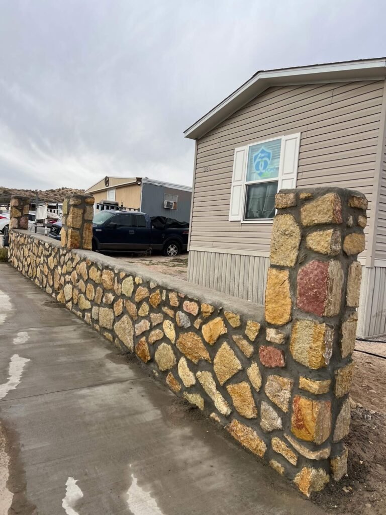 Low rock wall installation in El Paso TX