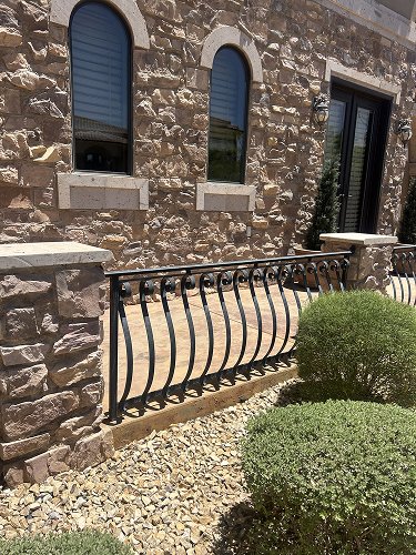 Decorative metal and stone veneer wall in El Paso Texas